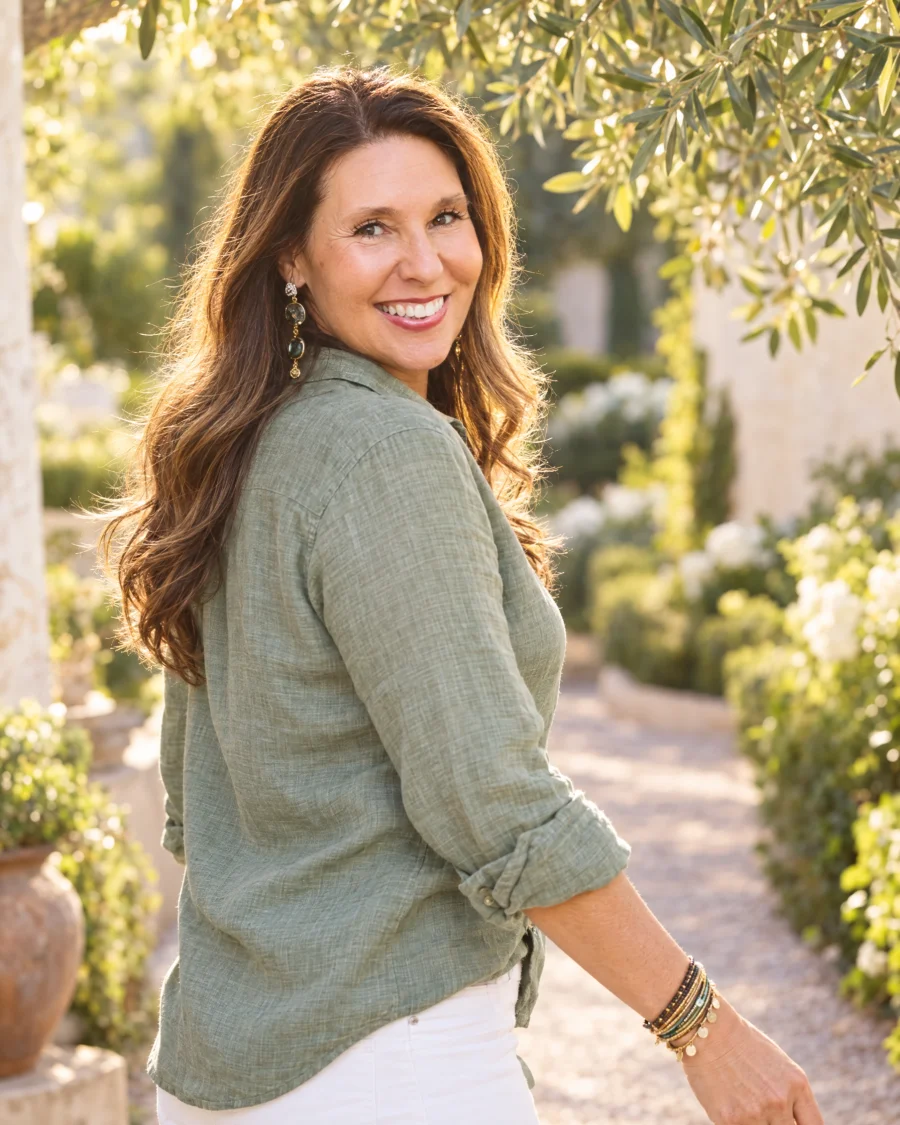 Allison Carmany in a softly sunlit garden, an illustrative portrait