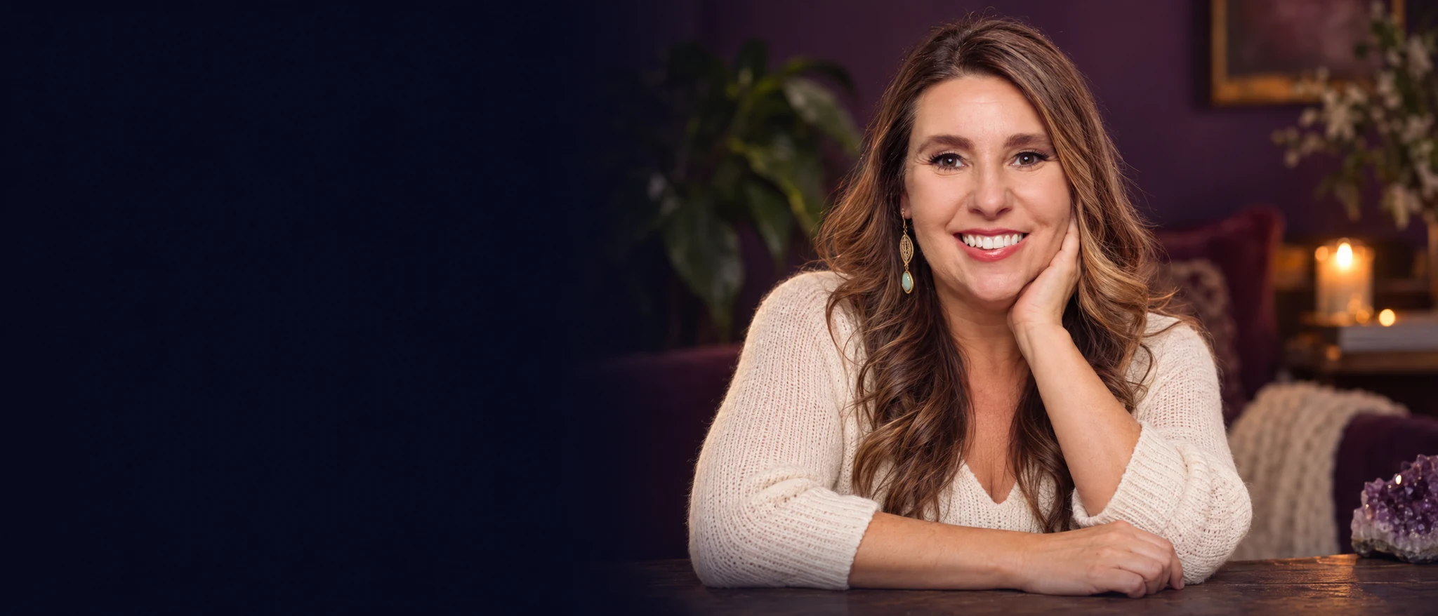 Allison Carmany smiling in a warmly lit room