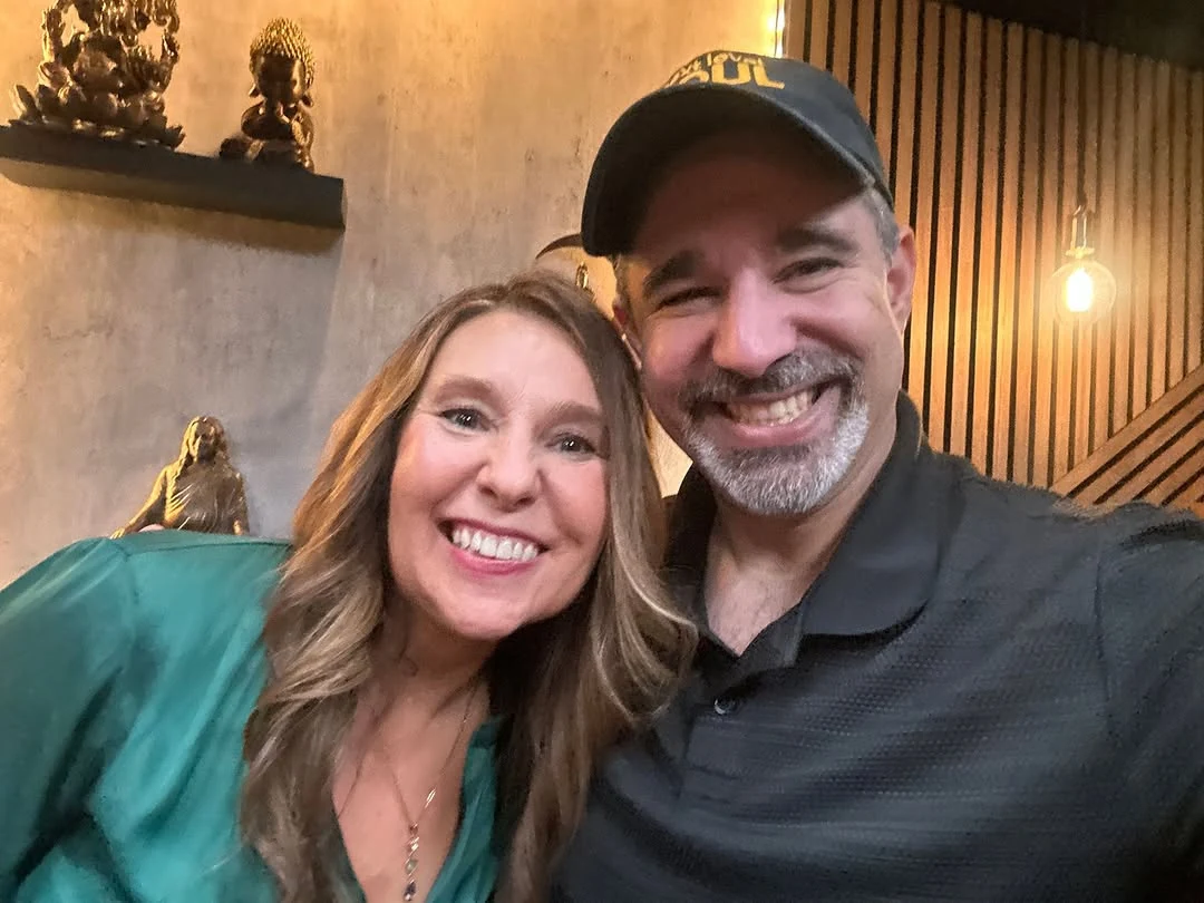 Allison Carmany and Alex Ferrari smiling together in the Next Level Soul studio